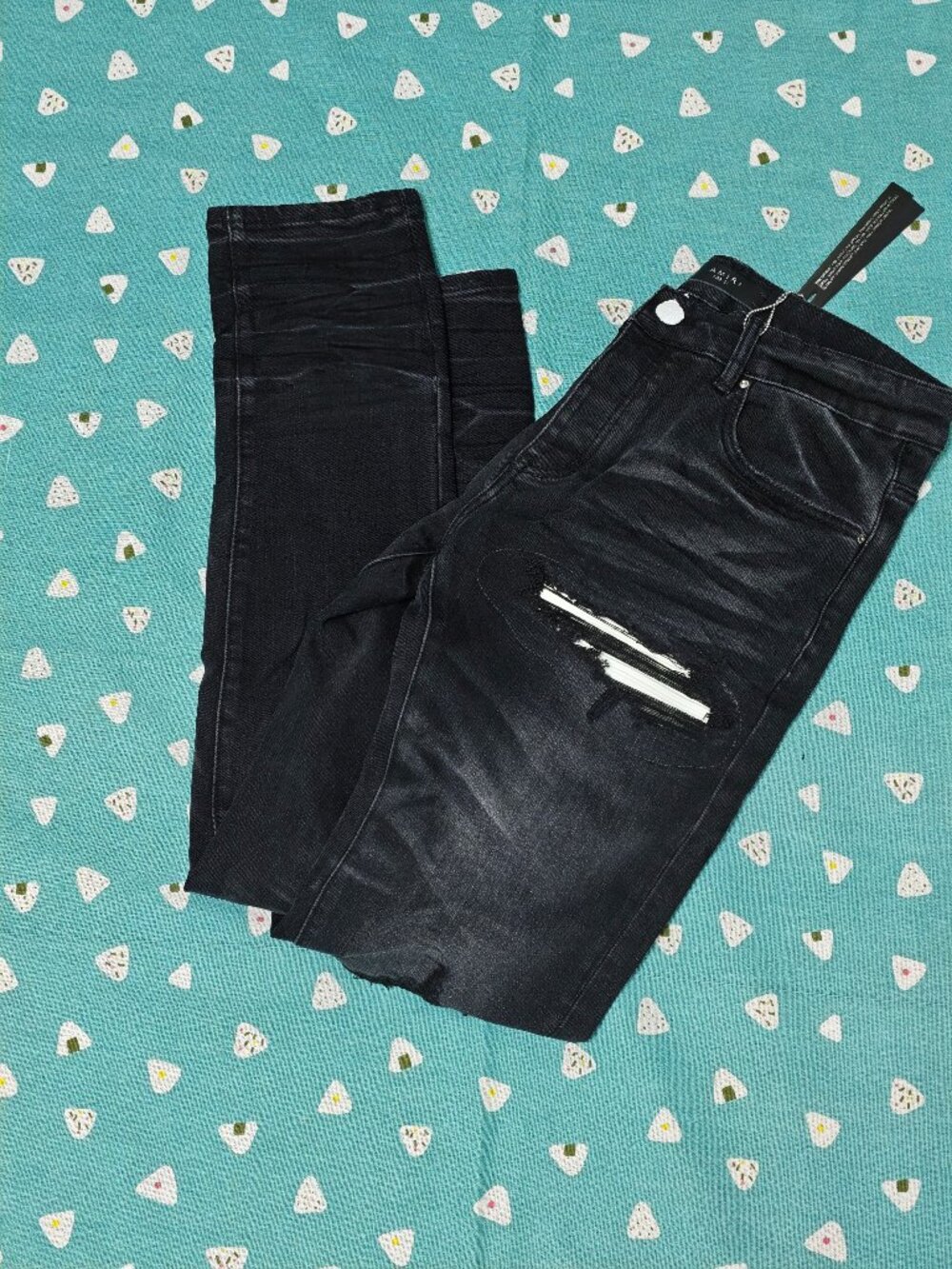AMIRI Black Distressed Skinny Jeans with Knee Rips